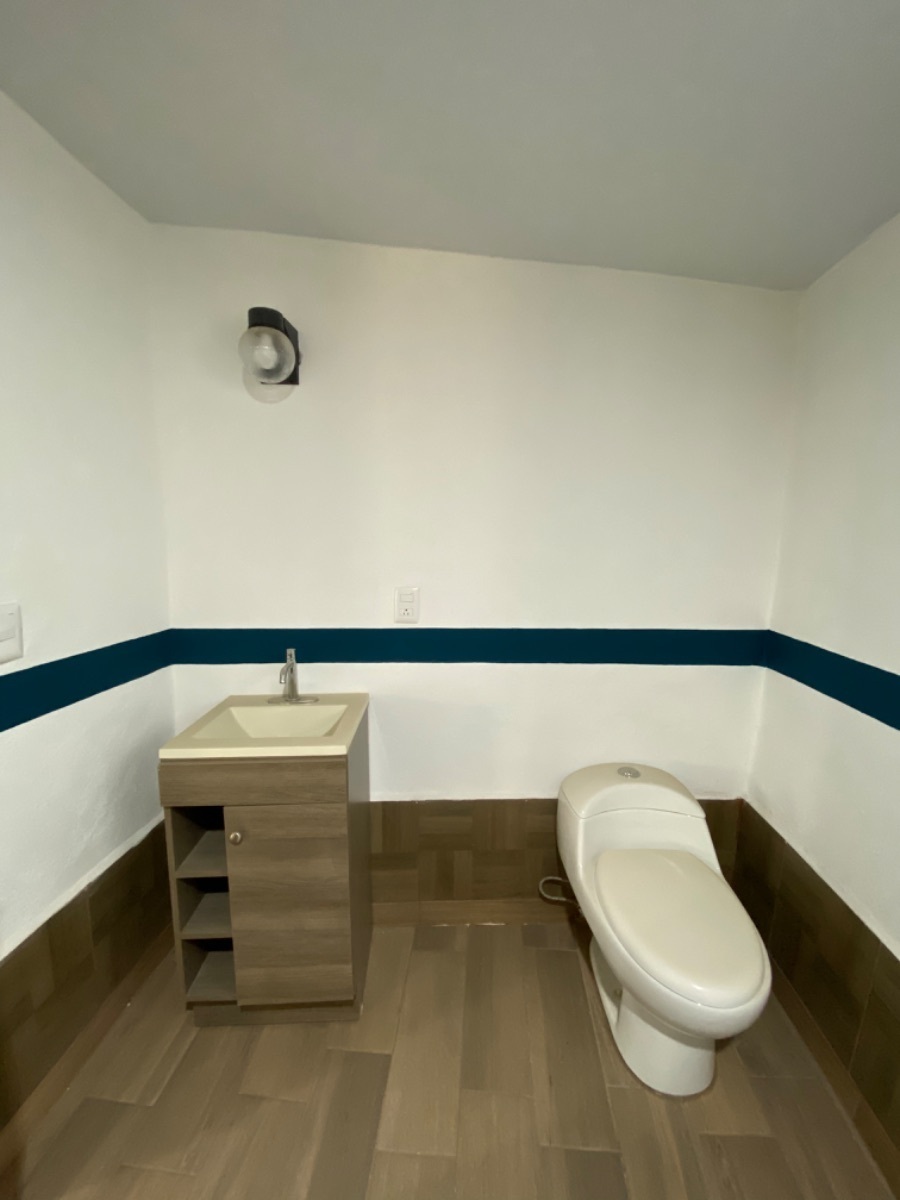 10 de 14: Baño de habitación