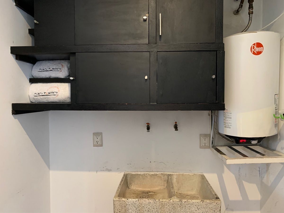 16 de 29: Área de lavado con calentador de luz 