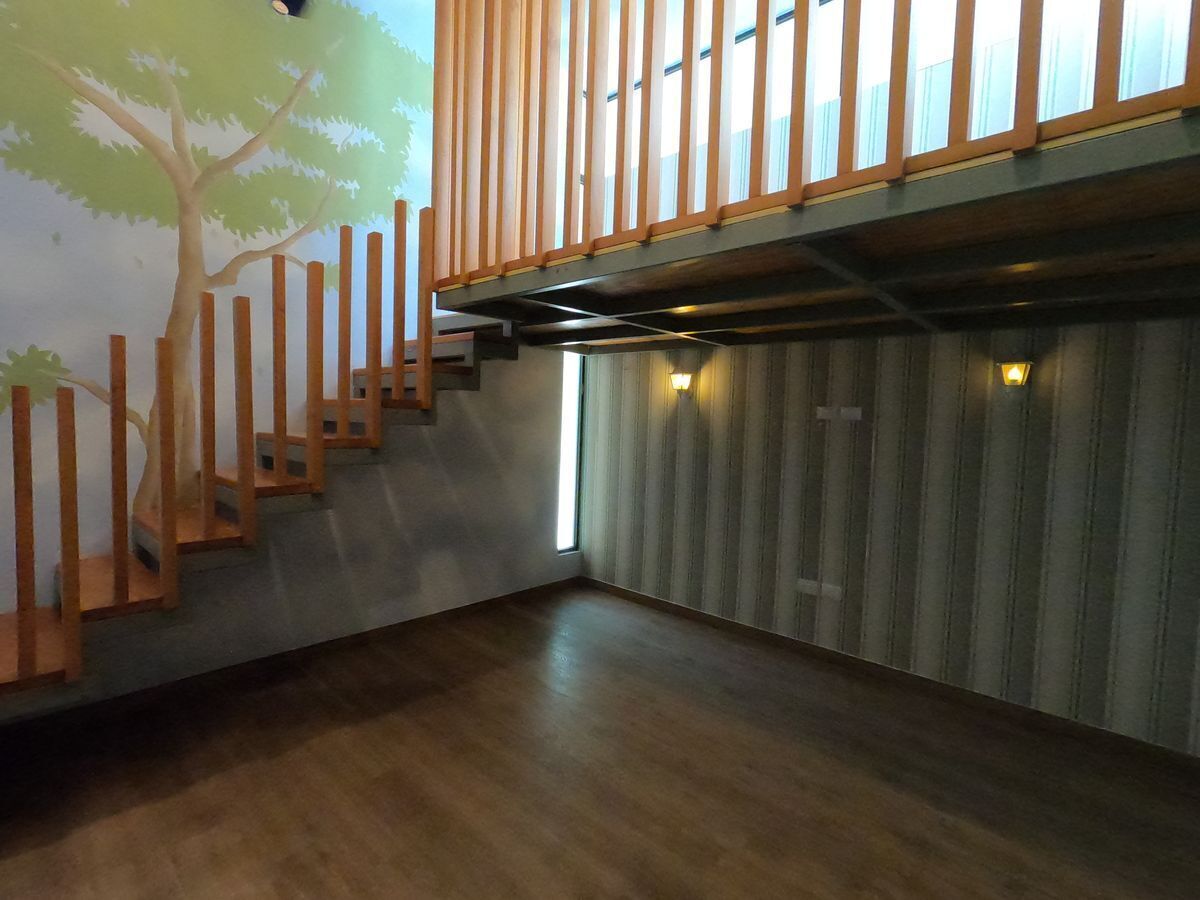 40 de 47: Espectacular escalera en madera casa Santa Gertrudis Copó