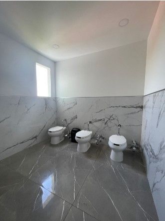 15 de 26: Baños Mujeres área comun 