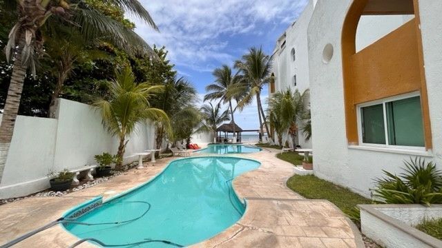 DEPARTAMENTO EN VENTA EN LA PLAYA EN CHICXULUB FRENTE AL MAR