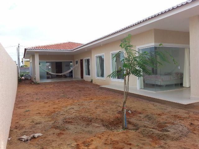 1 de 18: vista dos fundos lateral da casa