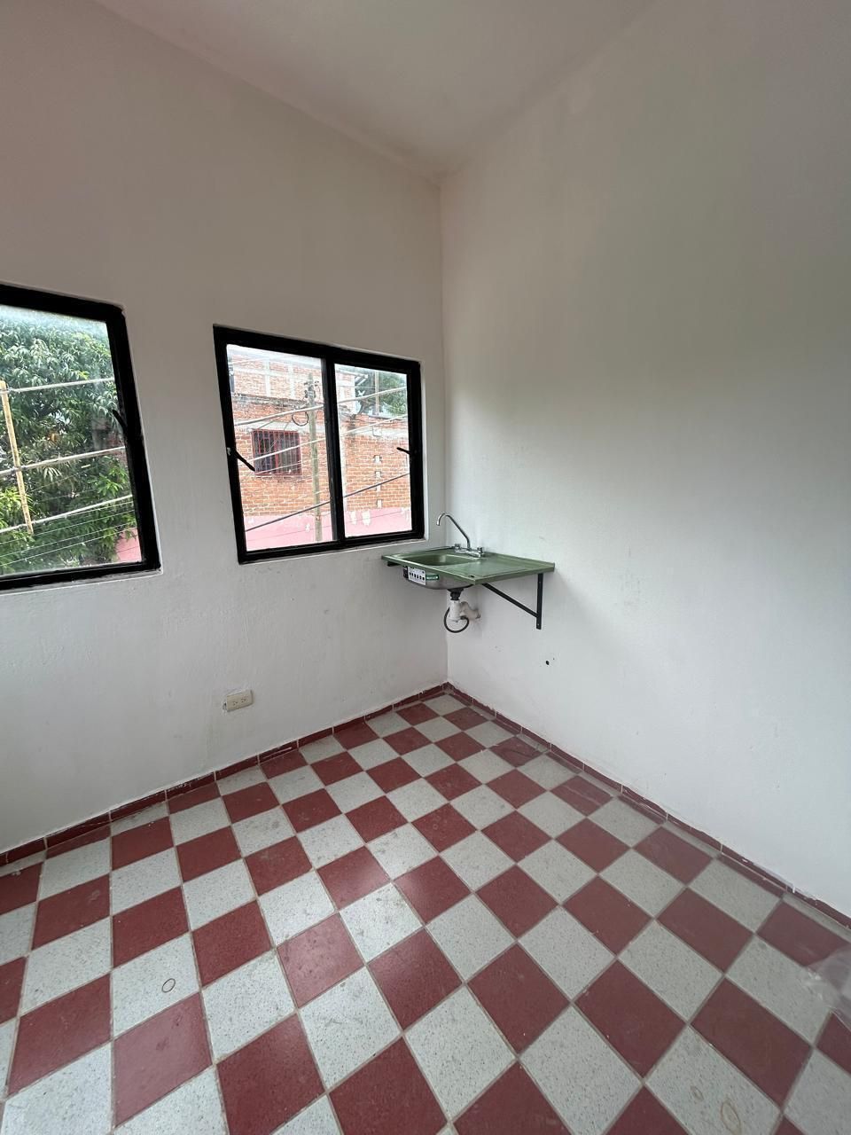 12 of 14: 12. Cocina - comedor