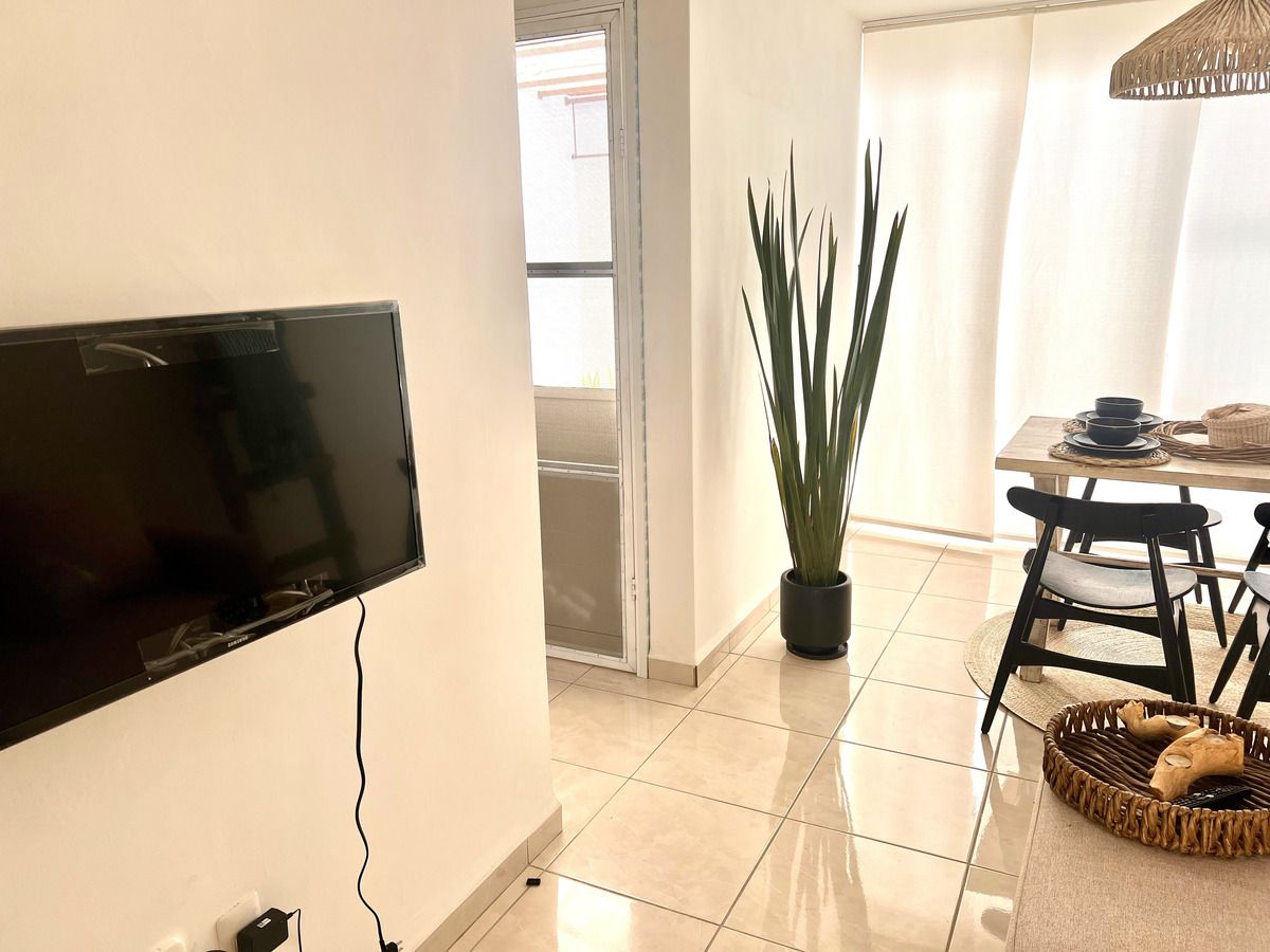 5 de 20: Sala con TV