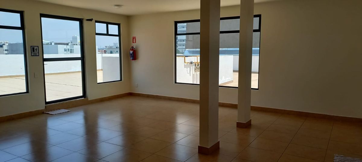 Zona común de área techada en terraza., foto 28 de 31