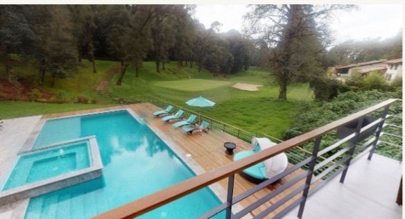 10 de 18: vista jacuzzi alberca y jardin