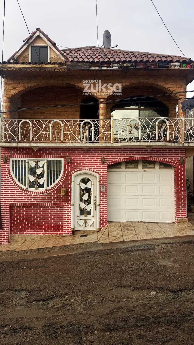 1 de 24: Frente de casa
