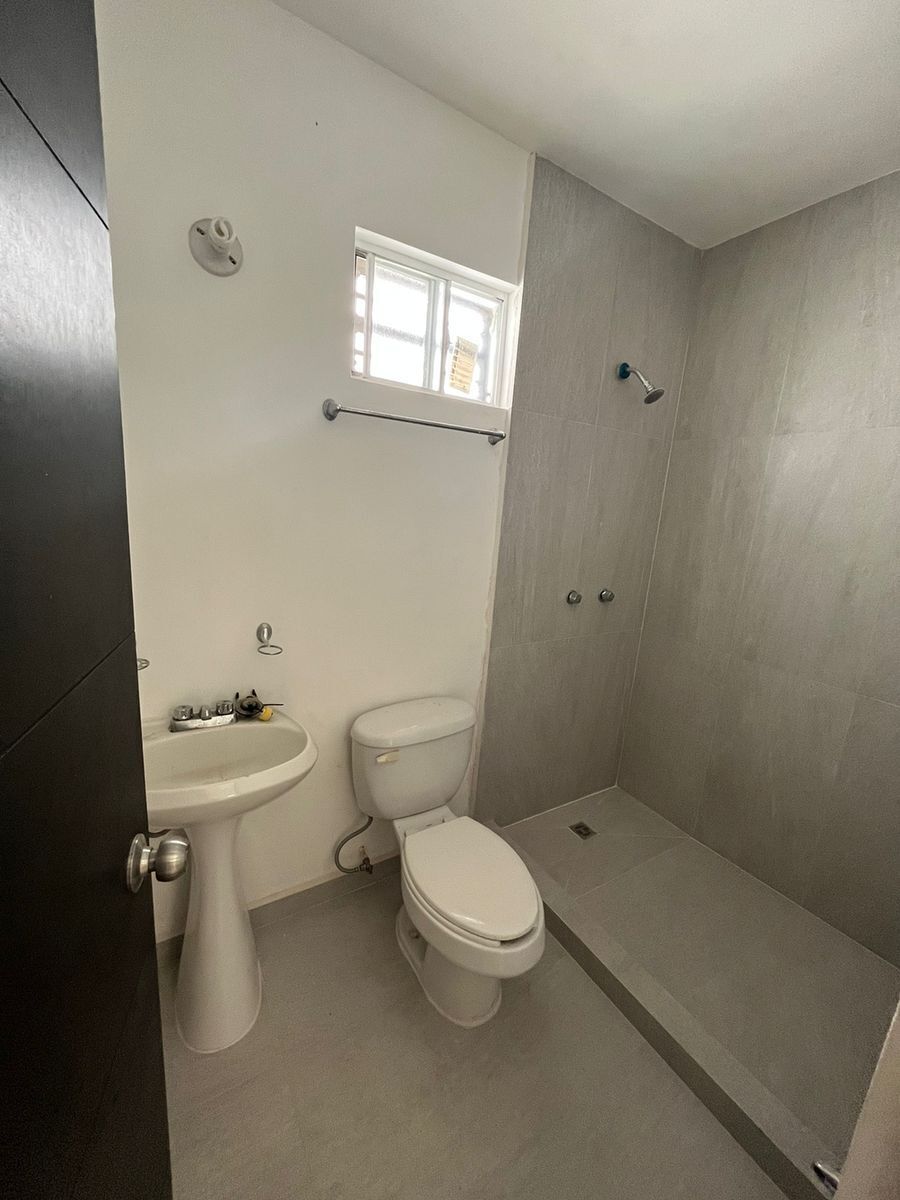 baño compartido