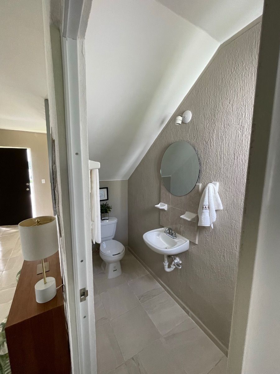 1/2 baño planta baja