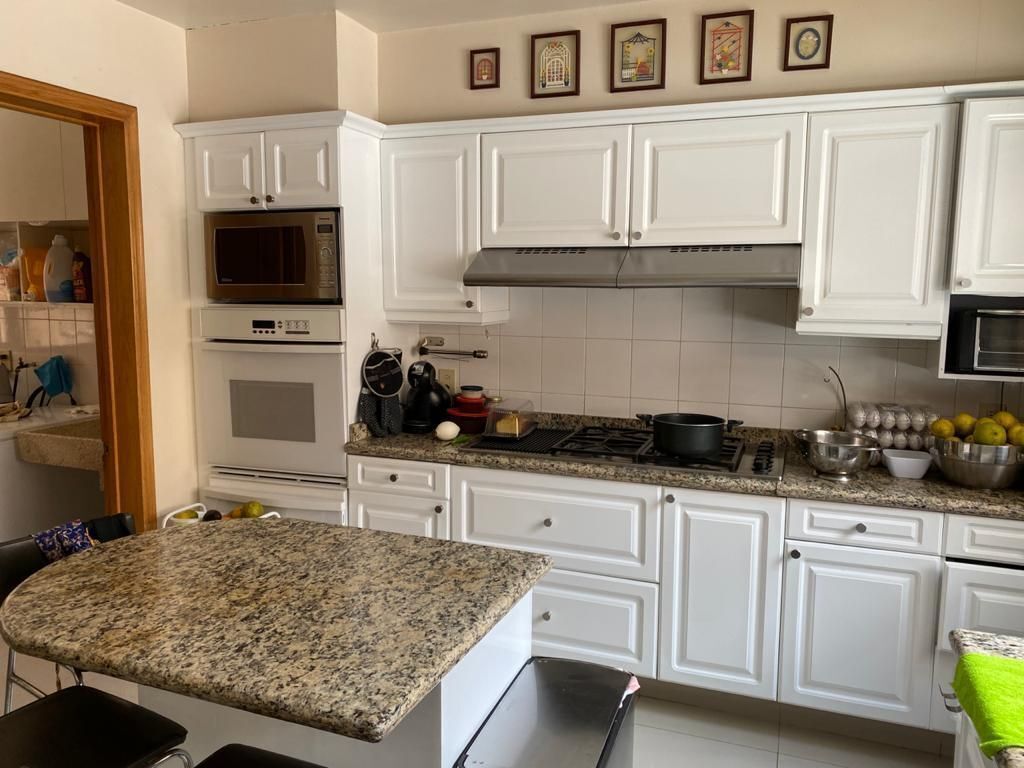 12 of 34: COCINA CON CUBIERTA DE GRANITO