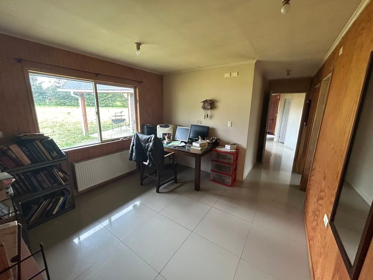 11 de 27: Oficina / salita casa 1