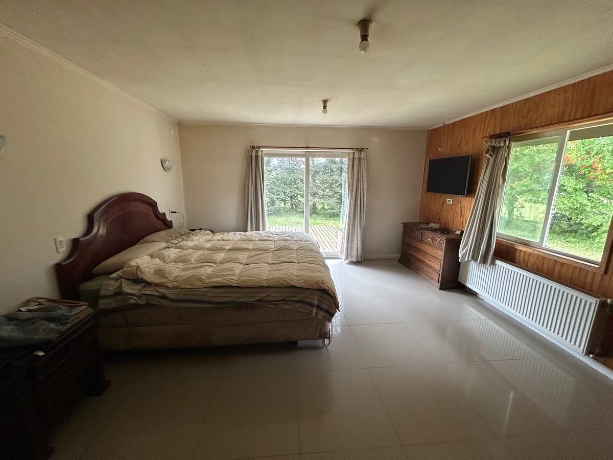 13 de 27: Dormitorio principal casa 1