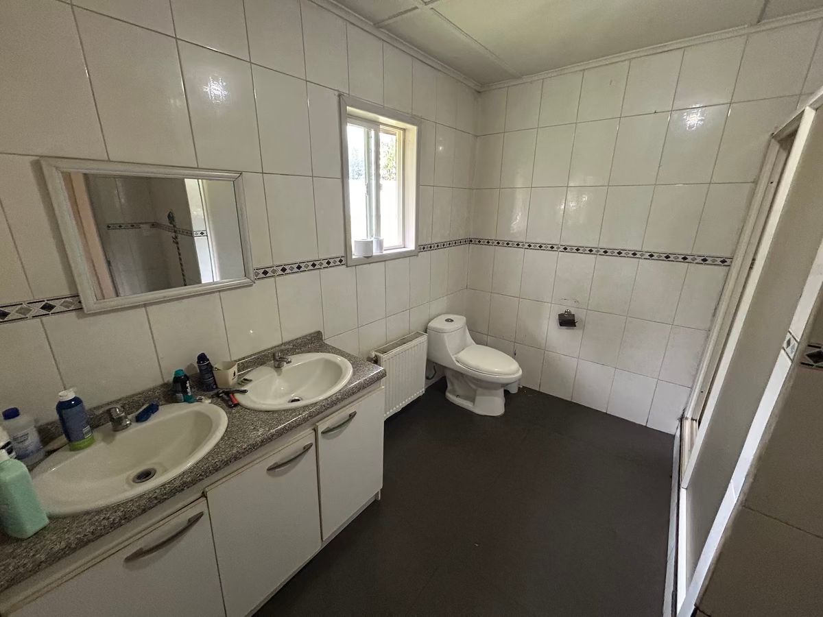 14 de 27: Baño principal casa 1