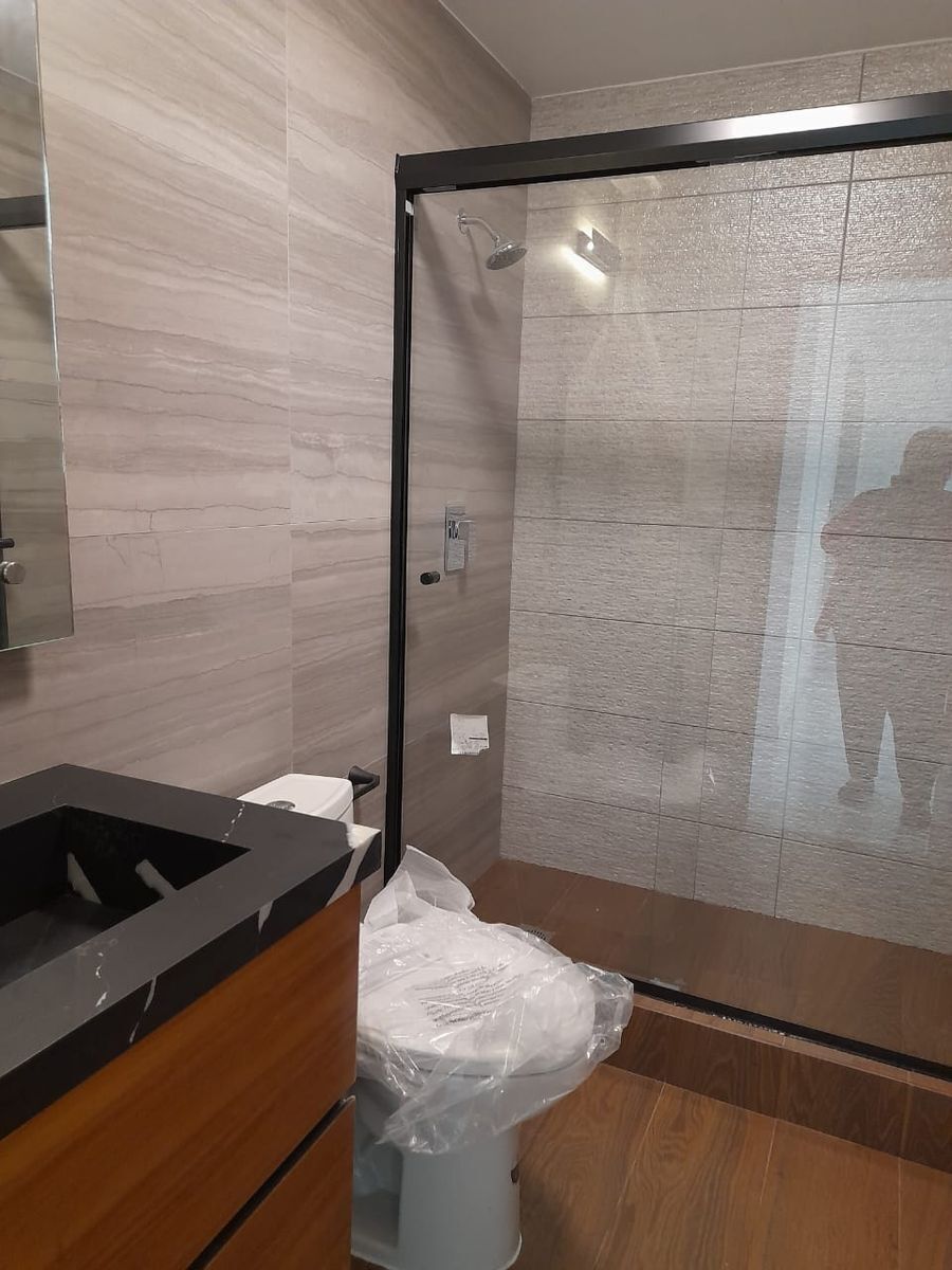 12 de 15: BAÑO EN COMUN