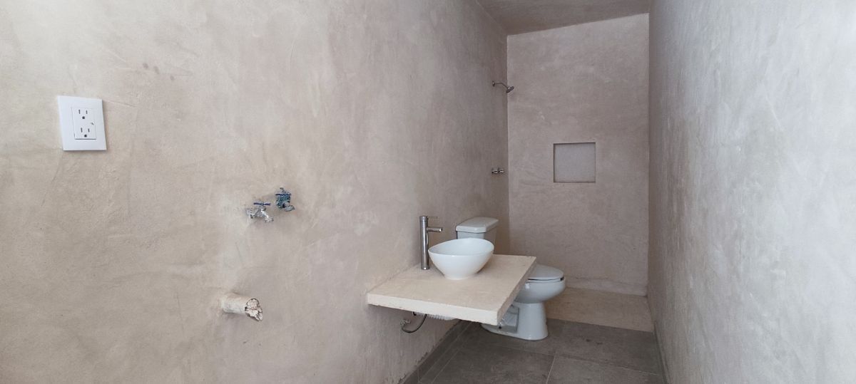 28 de 37: Area de Lavado y Baño para el area de Alberca