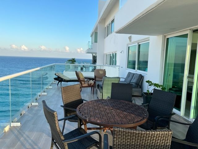 1 de 16: Amplia Terraza con vista al mar caribe y laguna nichupte