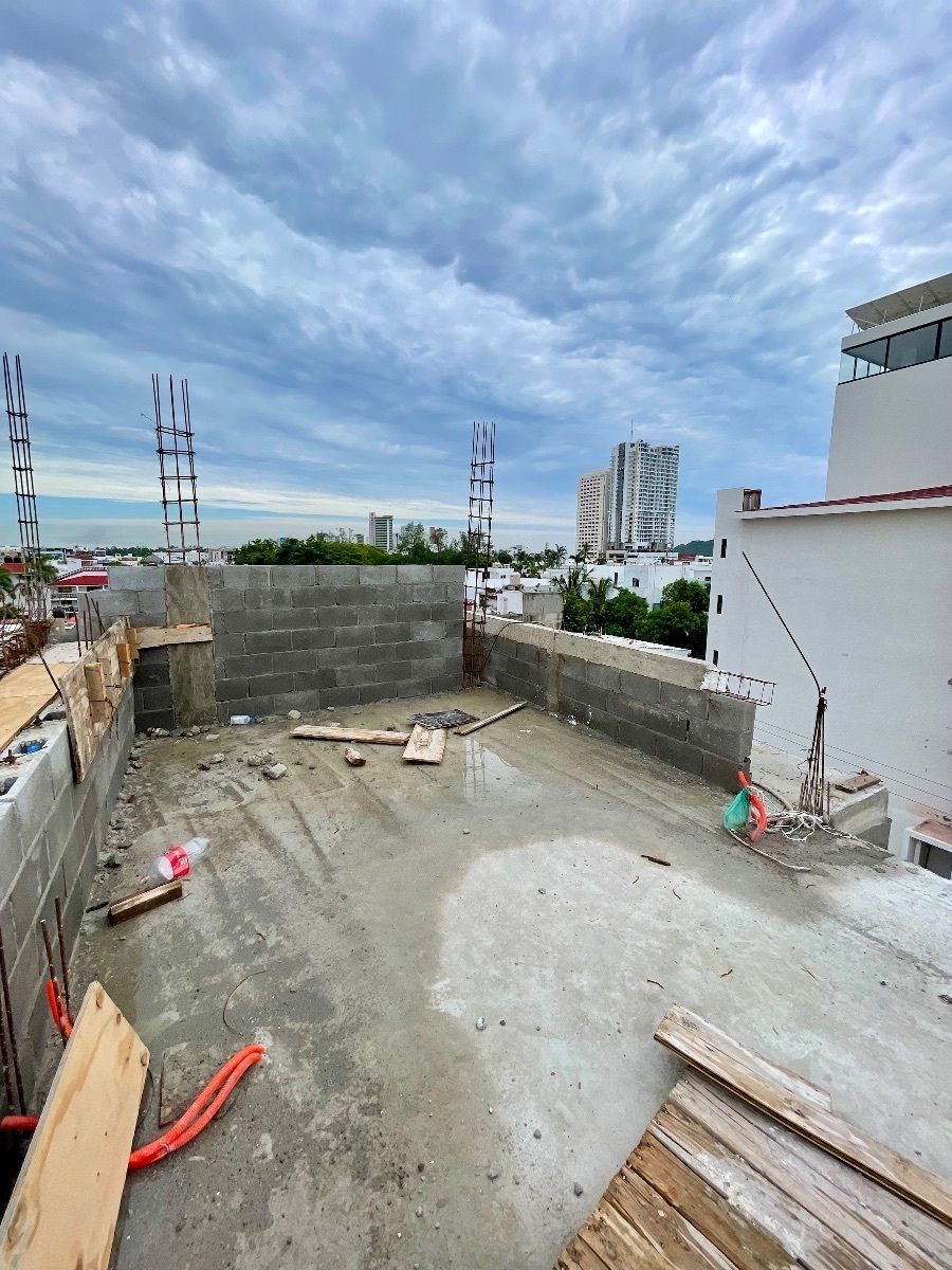 23 of 28: Rooftop - Pergolado con asadores