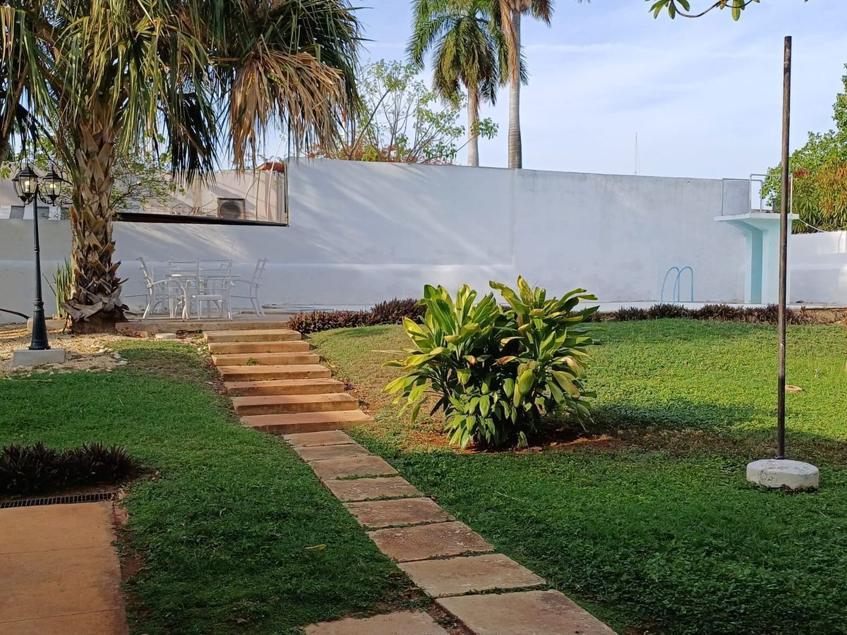 26 de 29: Jardín lado alberca