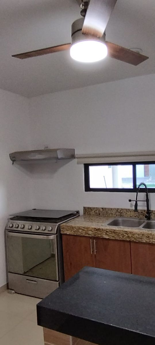 12 of 24: INCLUYE ESTUFA Y CAMPANA