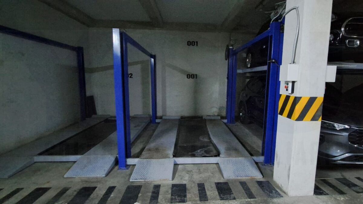 21 of 25: ESTACIONAMIENTO CON ELEVA-AUTO