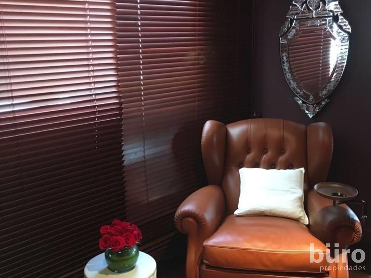 27 de 44: Elegante biblioteca en las áreas comunes