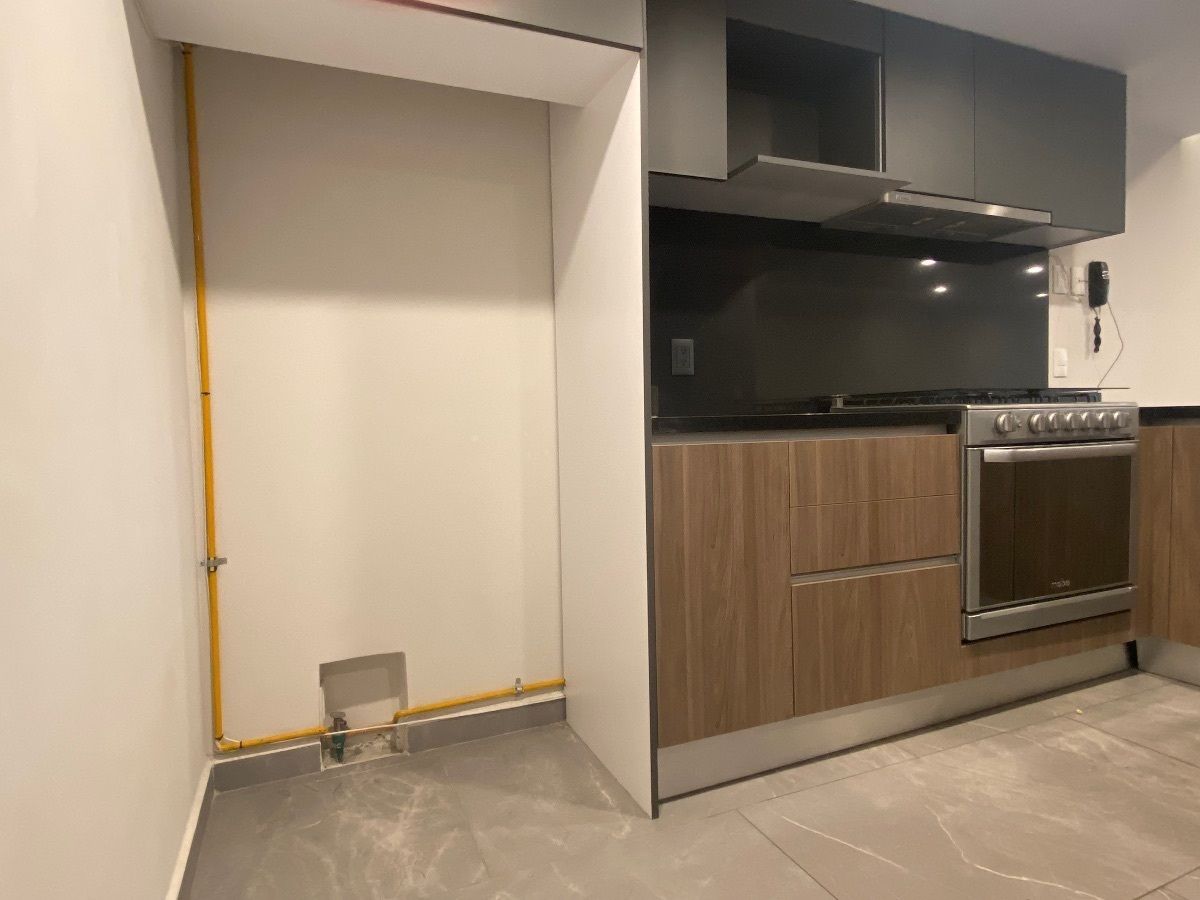 10 de 37: Cocina - espacio para refrigerador