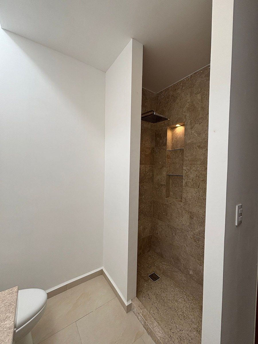 16 de 28: Baño Compartido