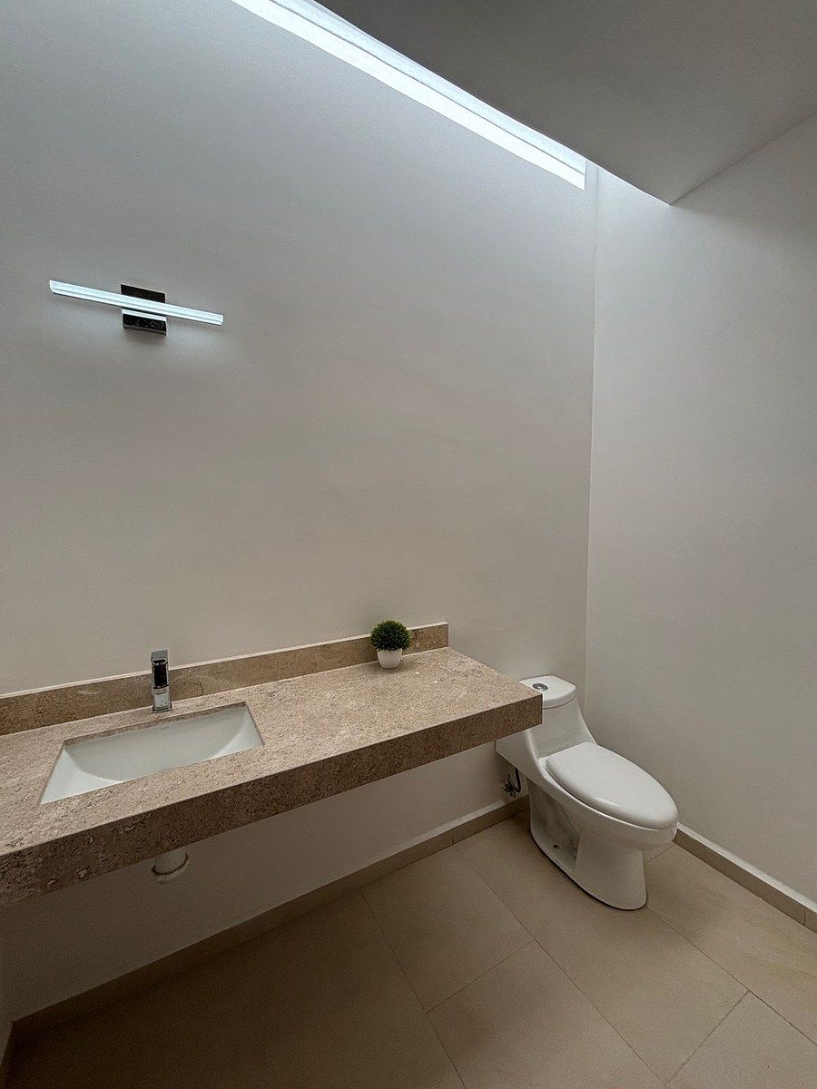 15 de 28: Baño Compartido