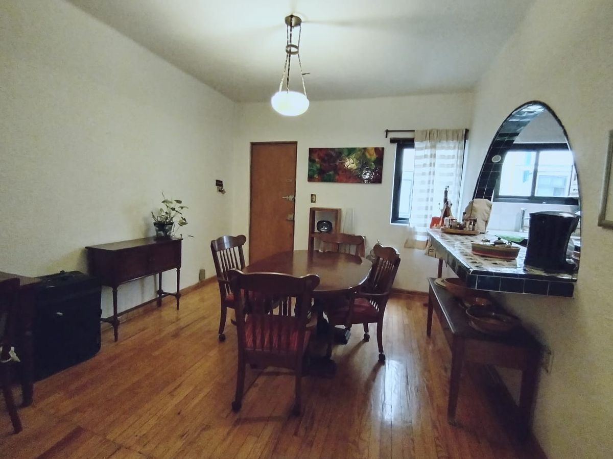 2 de 12: Área de Comedor.