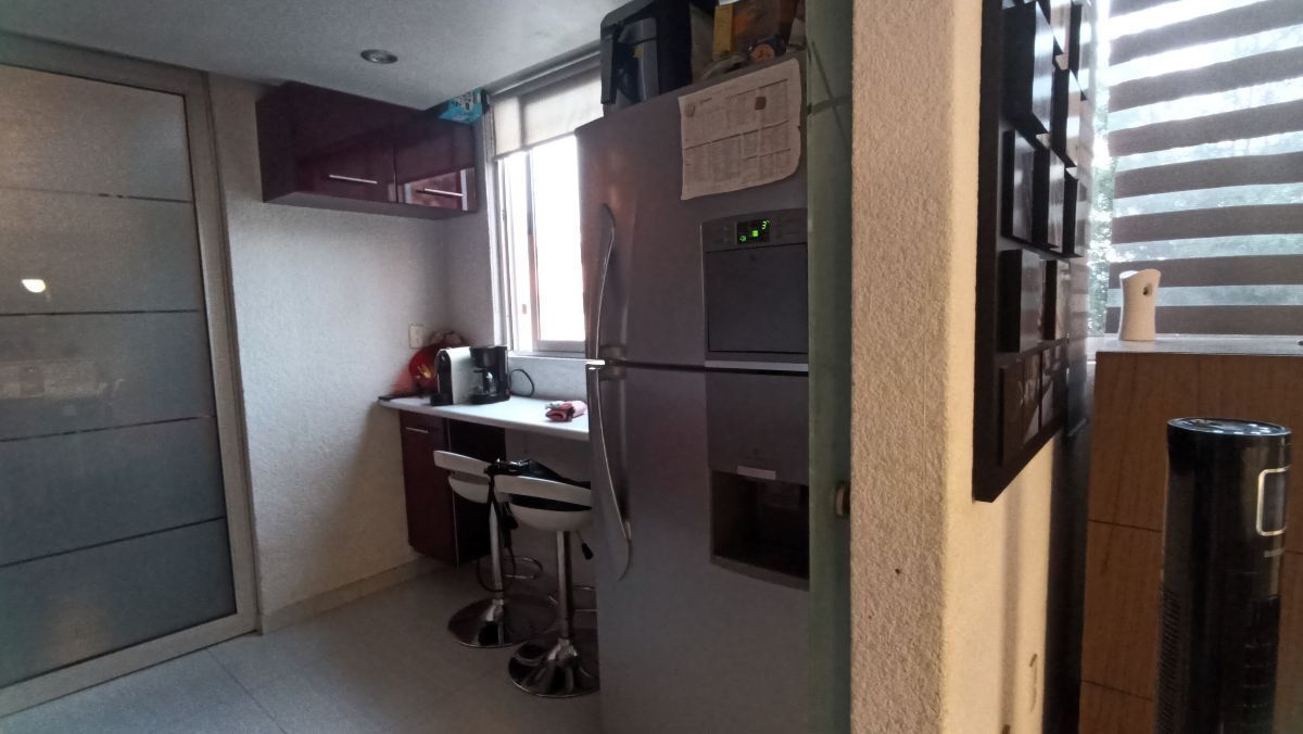 5 de 23: Barra en cocina
Acceso a Área de Lavado