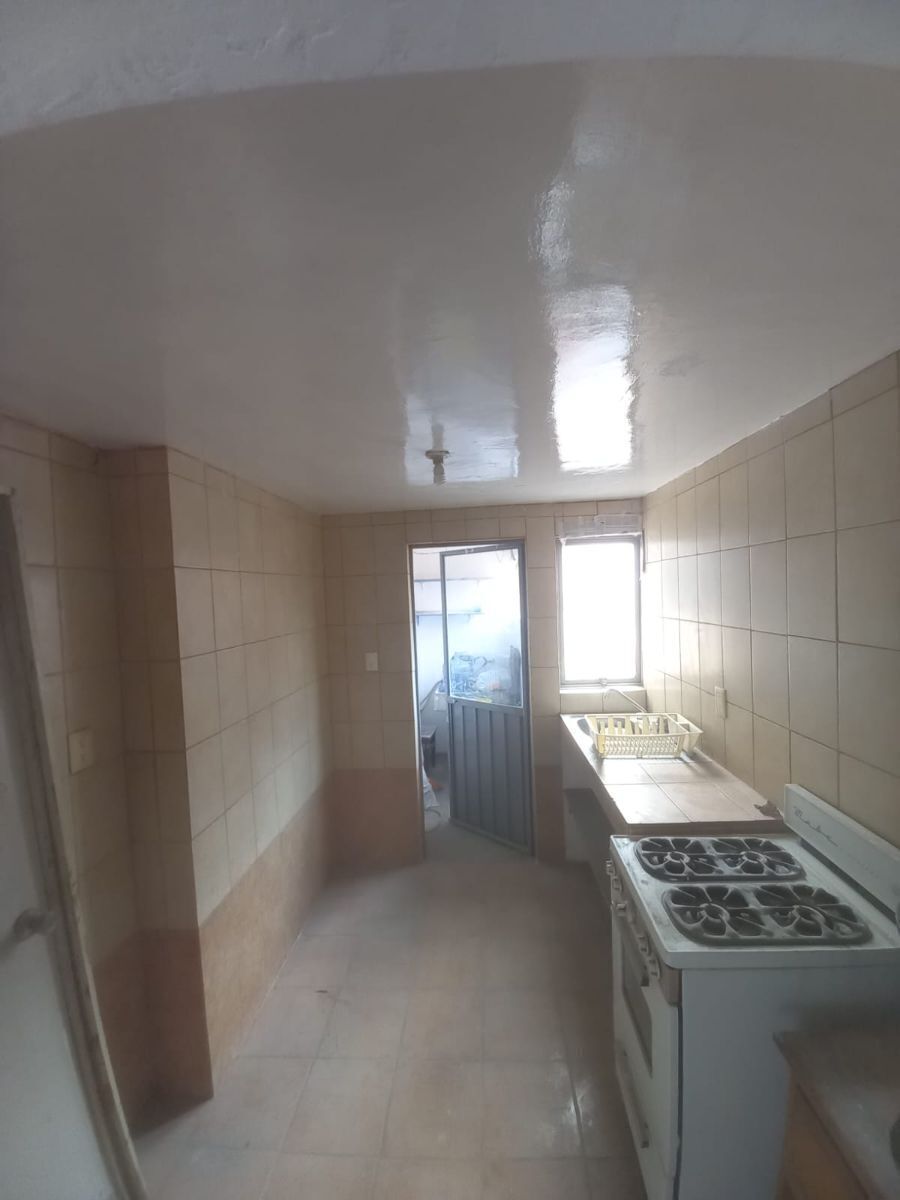 Cocina y área de lavado