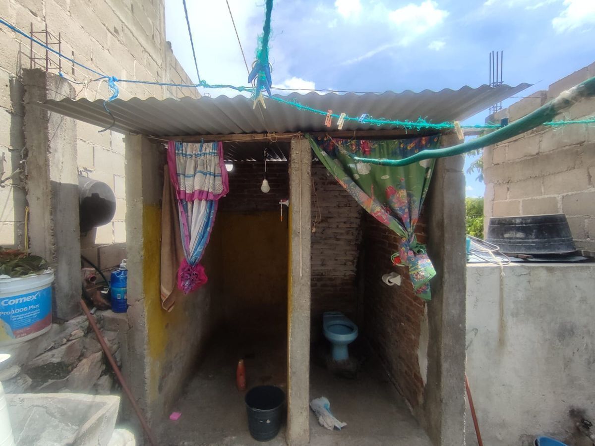 8 of 17: Area de lavado y Tanque