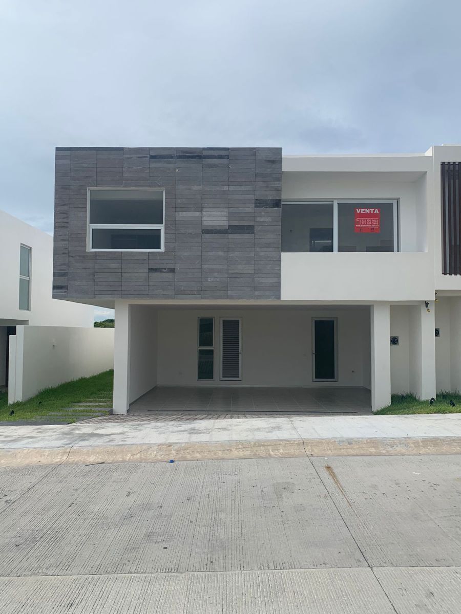 1 de 6: Frontal de la casa