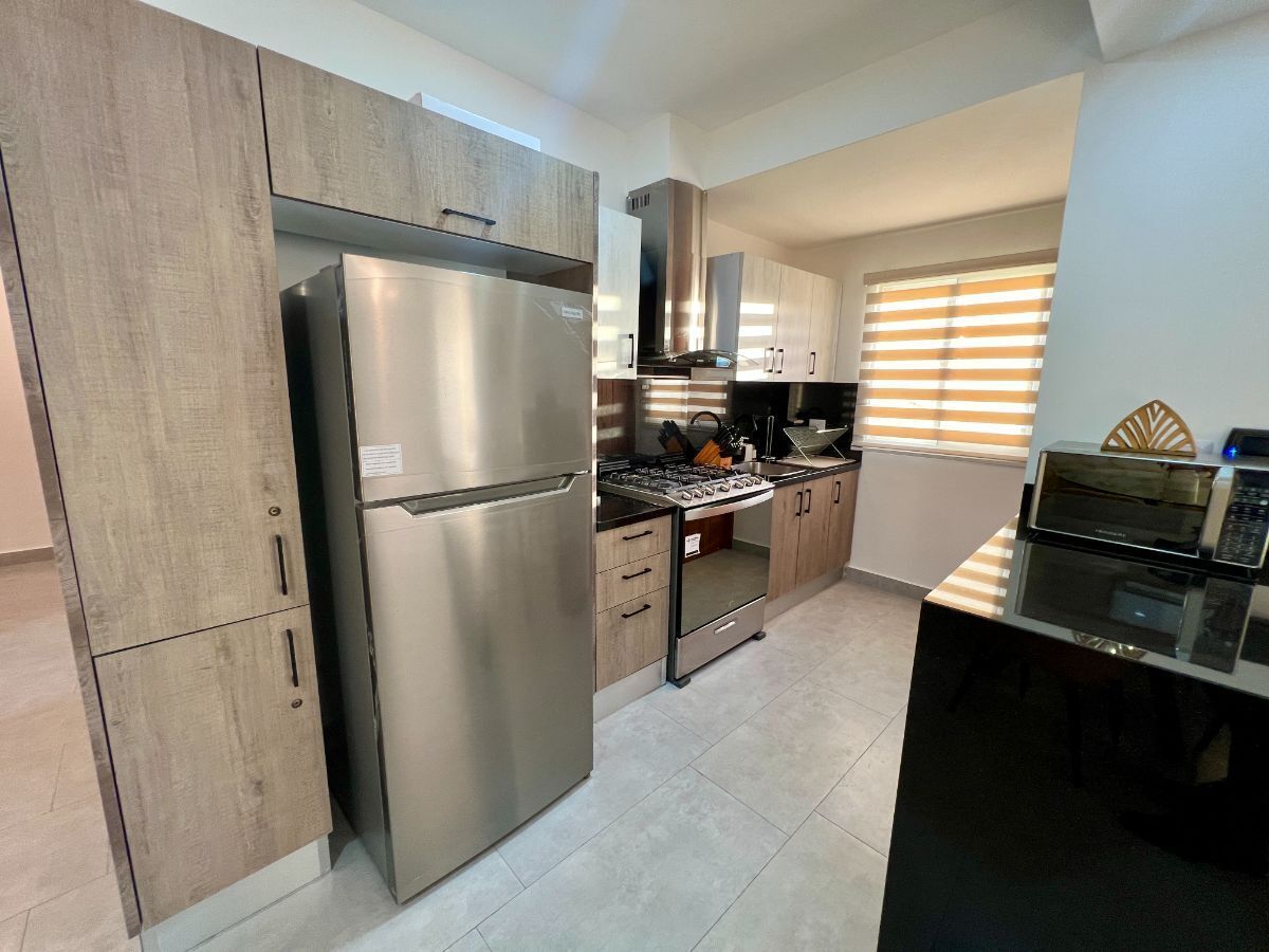 5 de 12: Cocina con desayunador