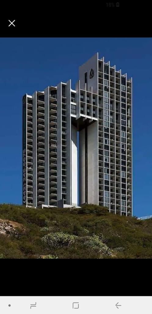 13 de 16: Edificio de departamentos