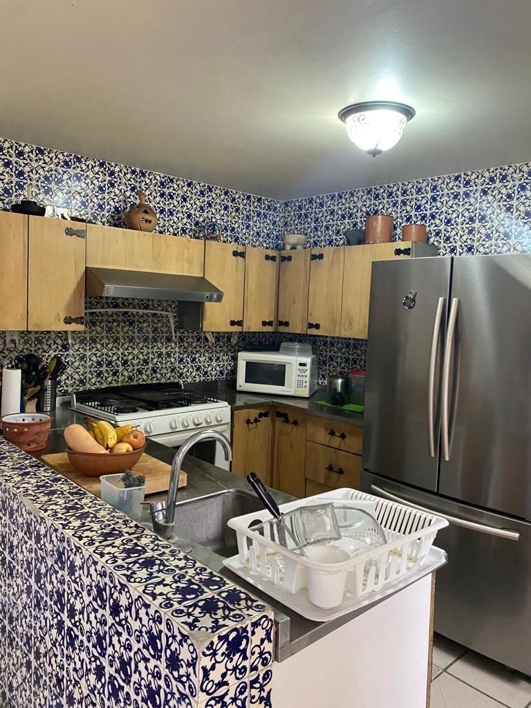4 de 20: Cocina integral con espacio para antecomedor.