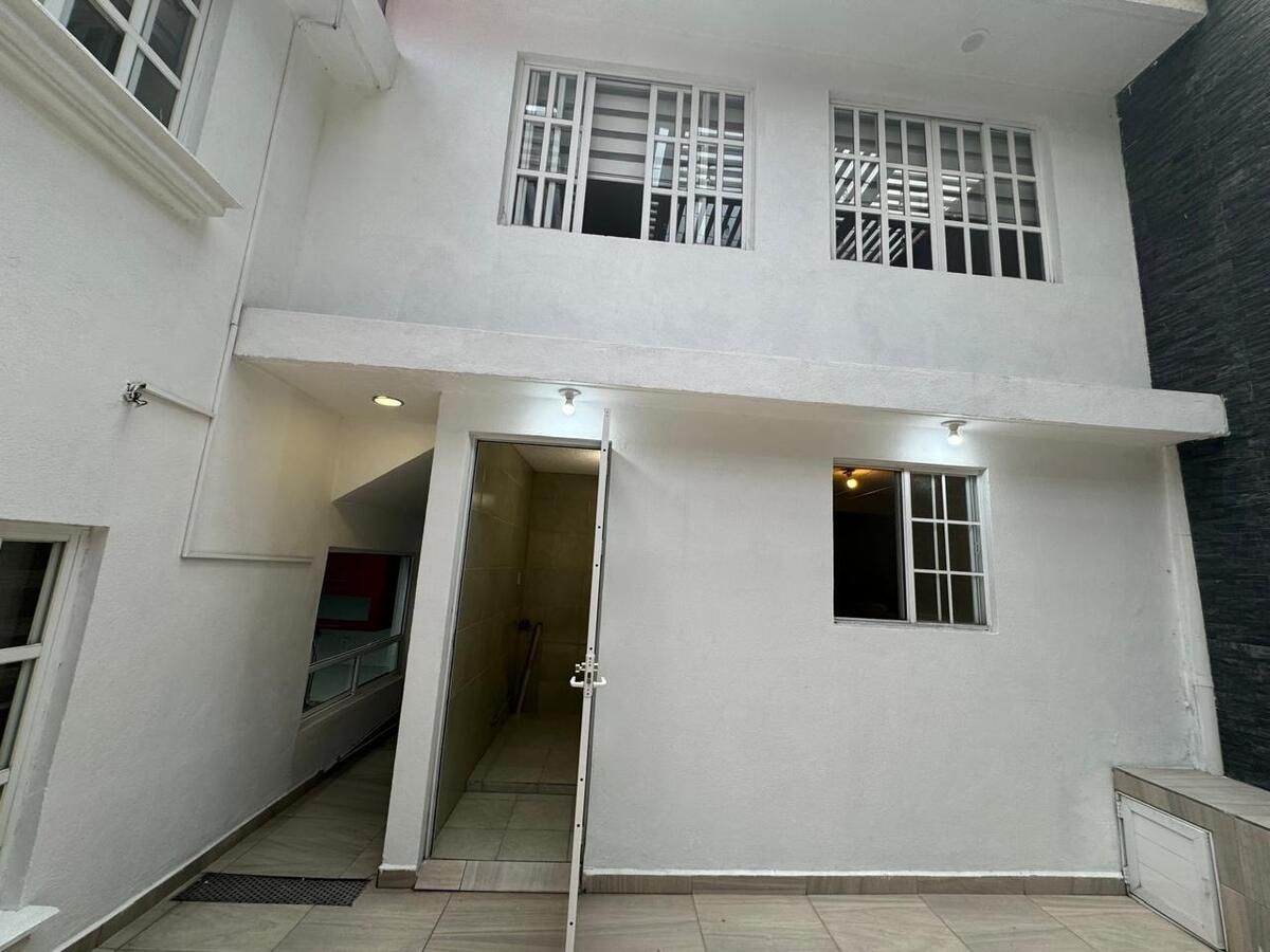 32 de 33: contra fachada