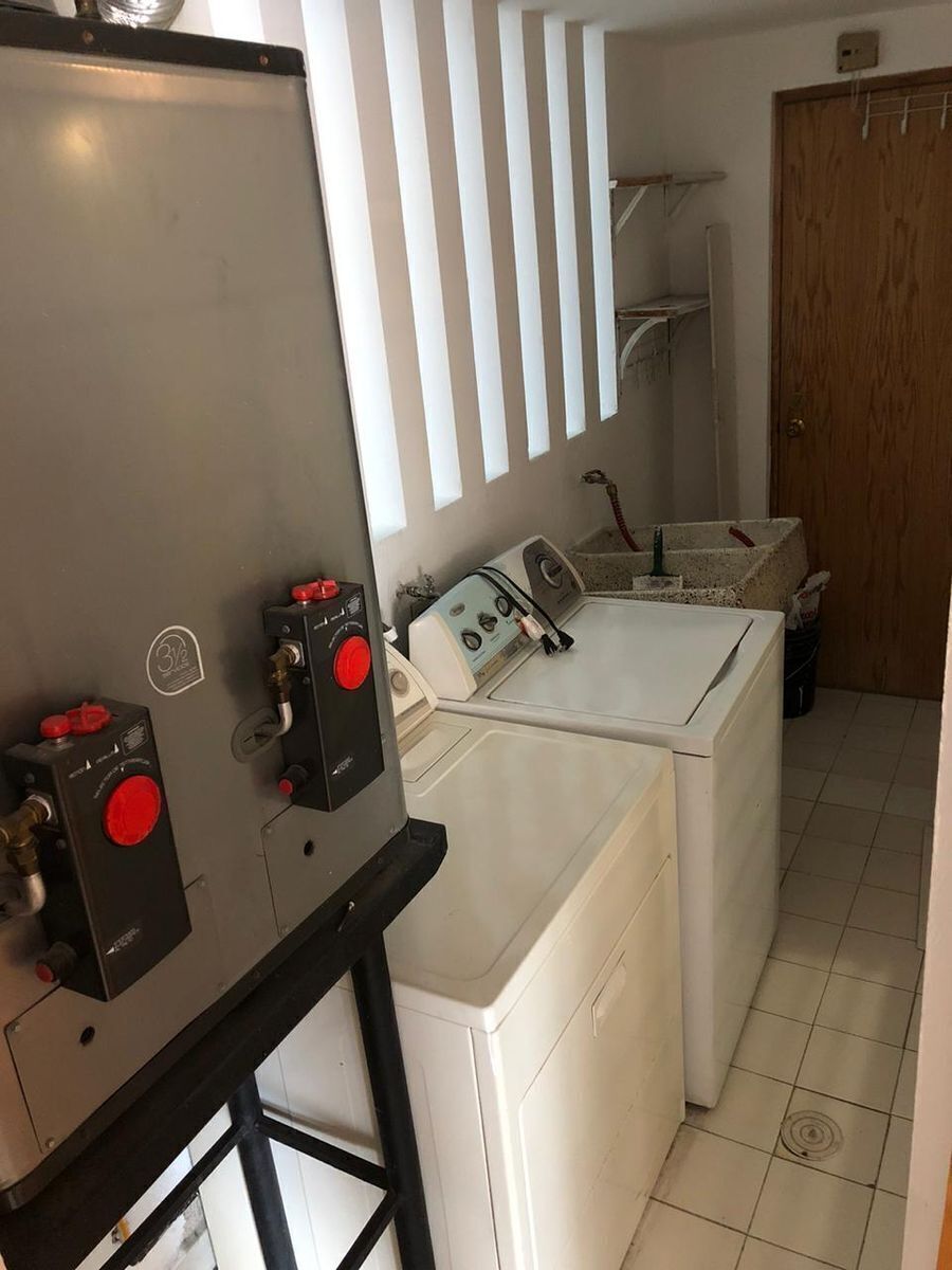 25 de 35: Área de Lavanderia