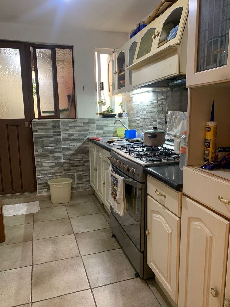 5 de 11: Cocina integral y patio y área de servicio