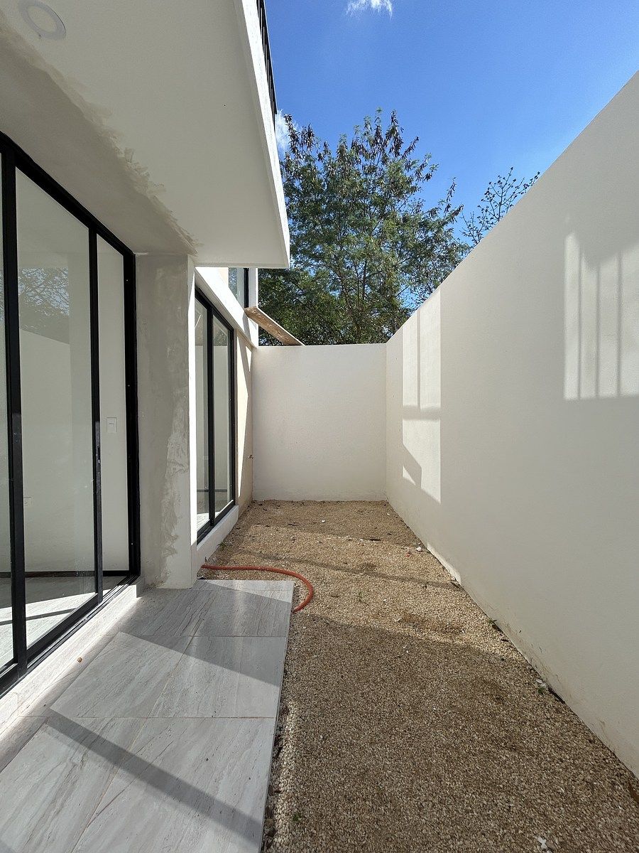 7 de 16: Patio departamento PB