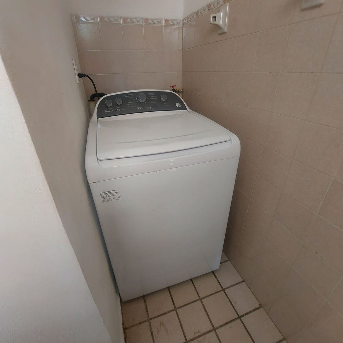 19 de 20: área de lavado de uso común con lavadora y secadora