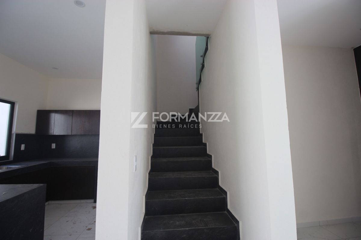Escaleras con barandal de cristal templado