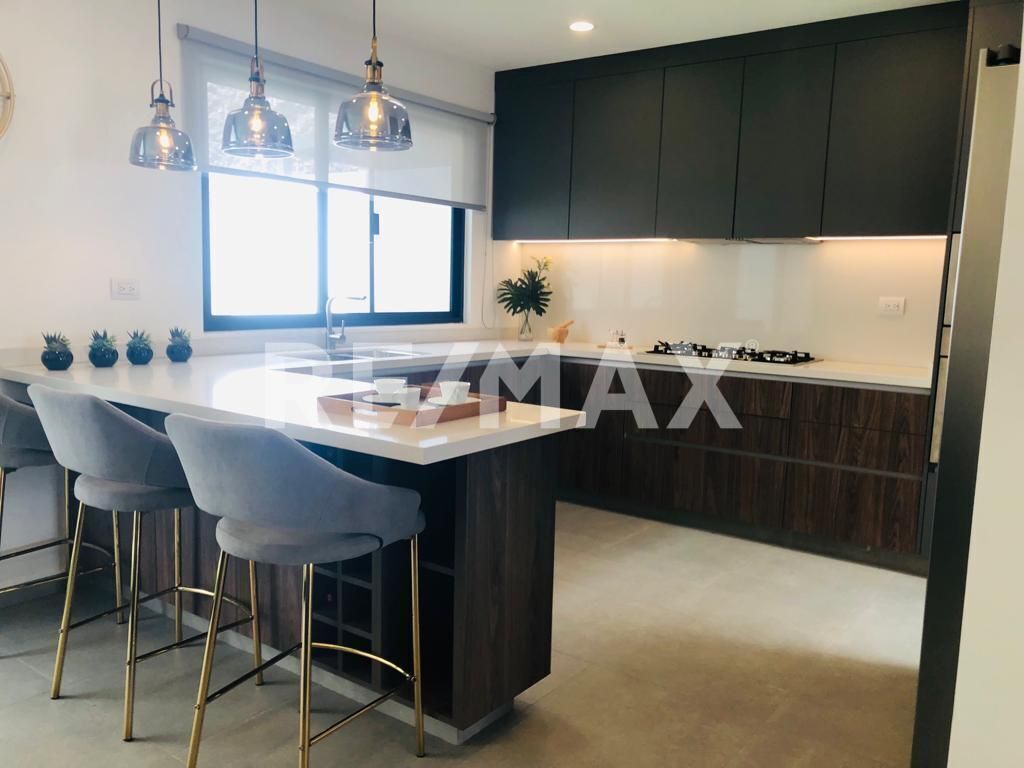 8 de 16: cocina equipada / barra de cuarzo