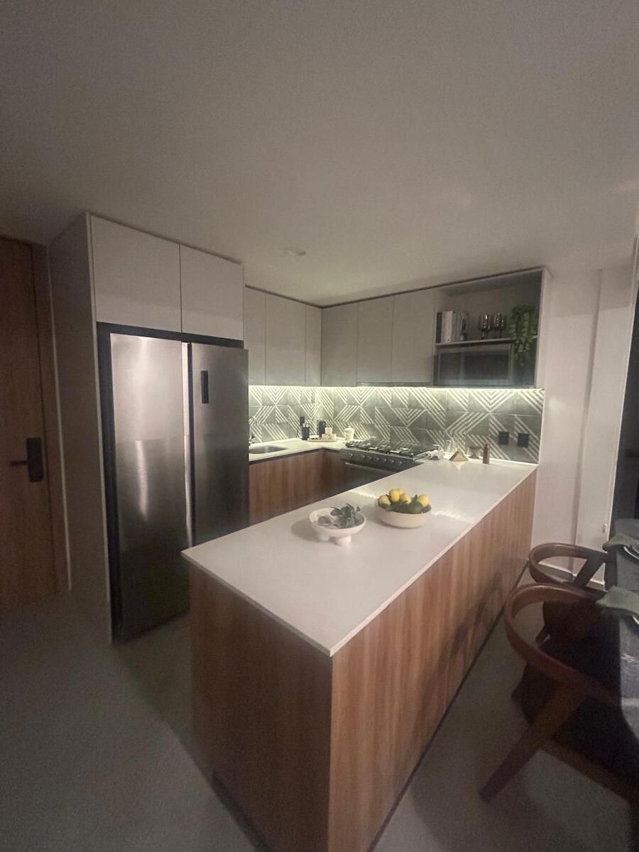 2 de 22: cocina  estufa, campana , tarja de acero inox. y tope  grani