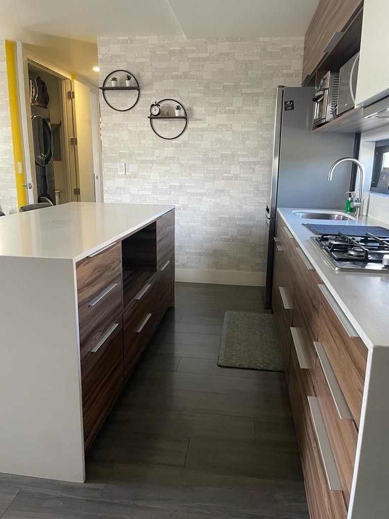 14 de 34: Cocina con barra de cuarzo