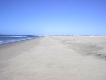 1 of 11: Frente de playa arena blanca