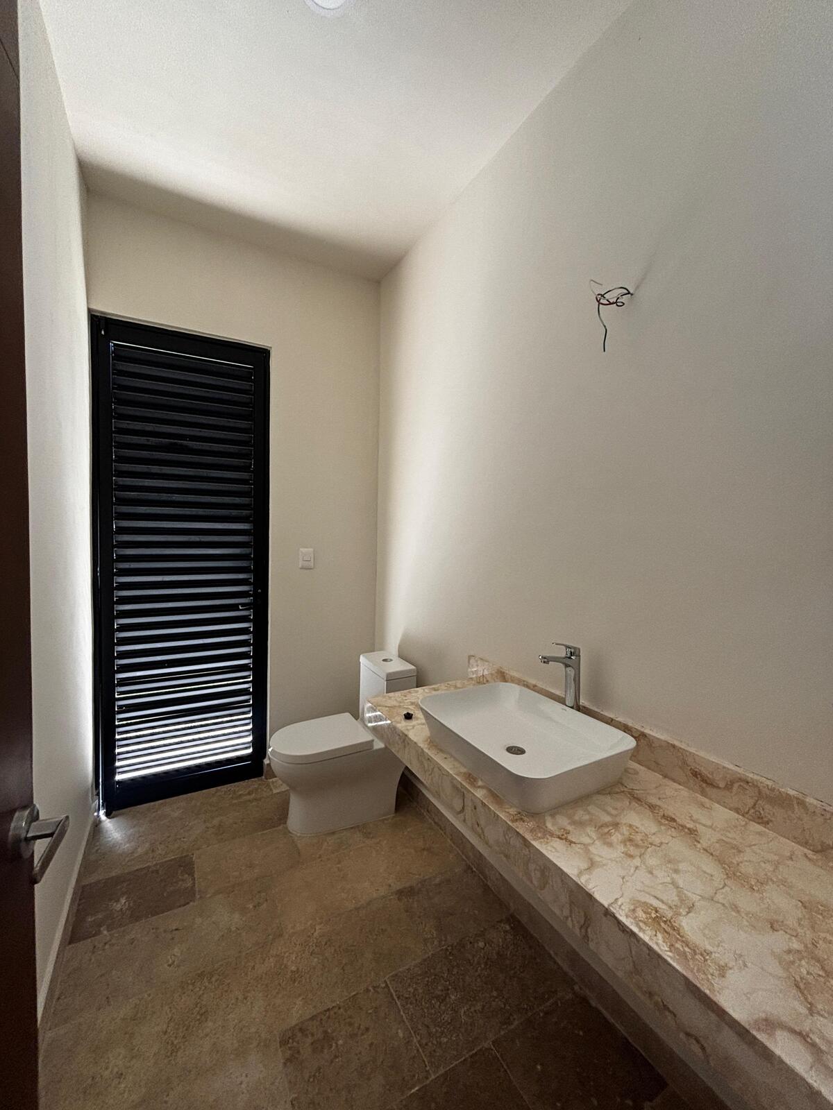 13 de 39: Medio Baño