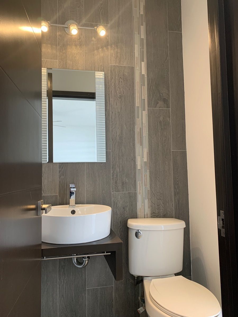 Medio baño de visitas, foto 7 de 35