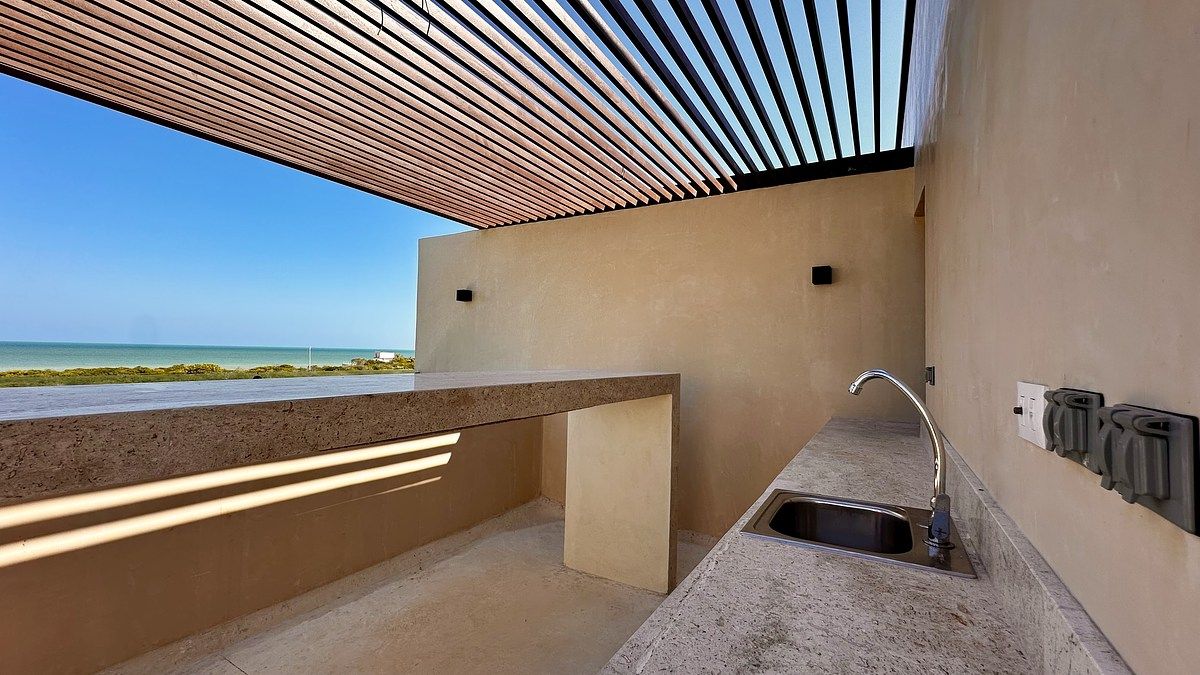 3 de 11: Barra con pergola y vista al mar