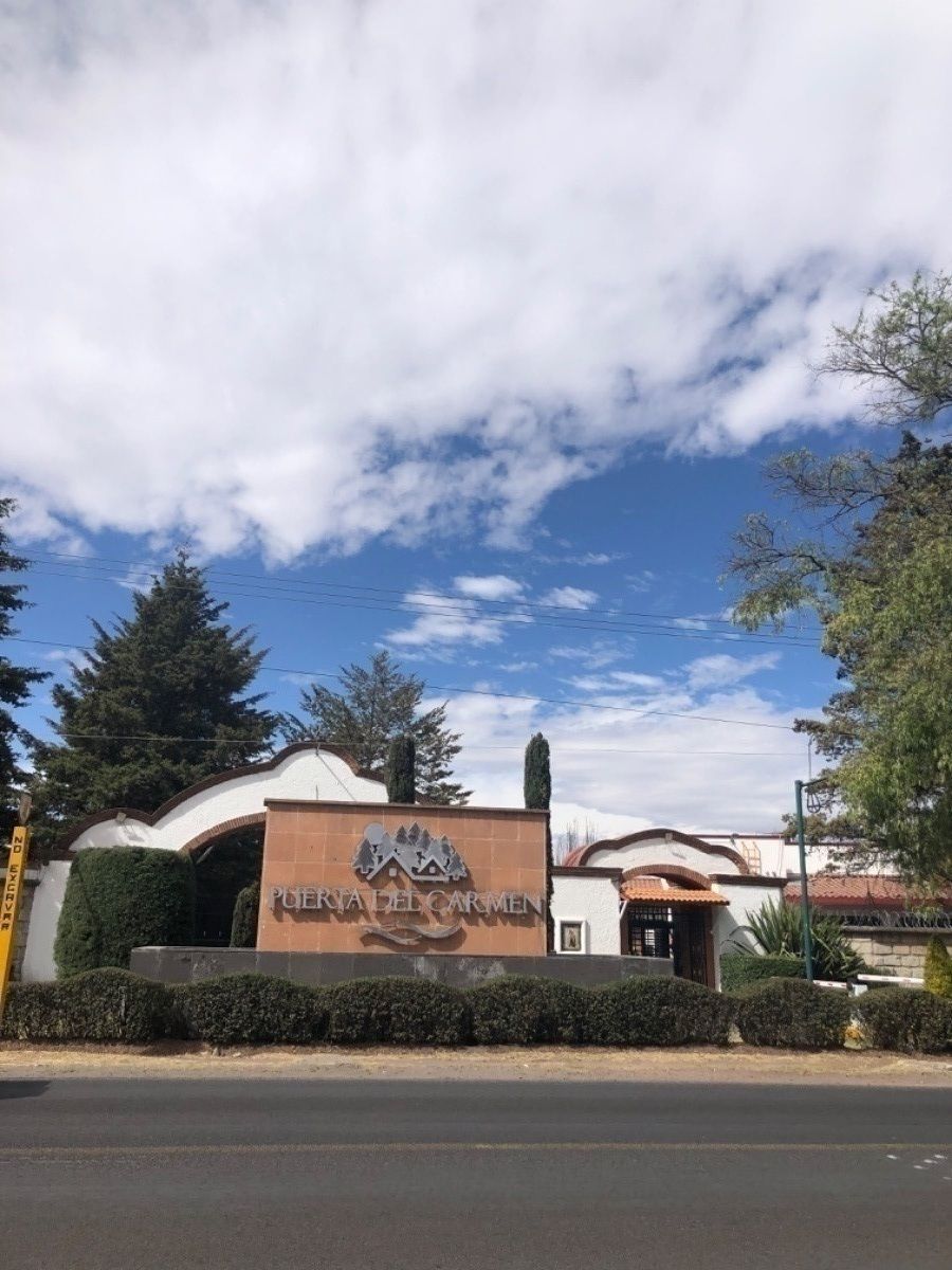 4 de 11: Entrada fraccionamiento Puerta del Carmen.